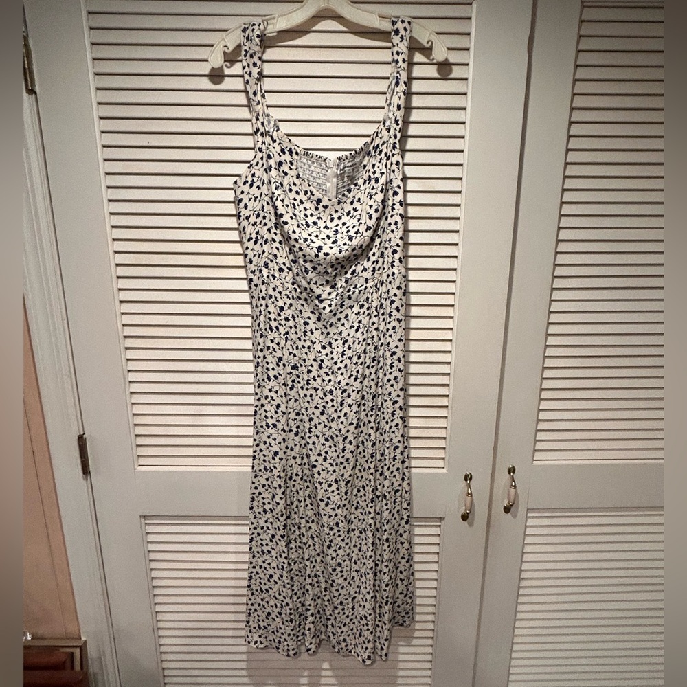 Reformation Blue and Cream Sleeveless Floral Dress
Feels like silk 
Size 12,